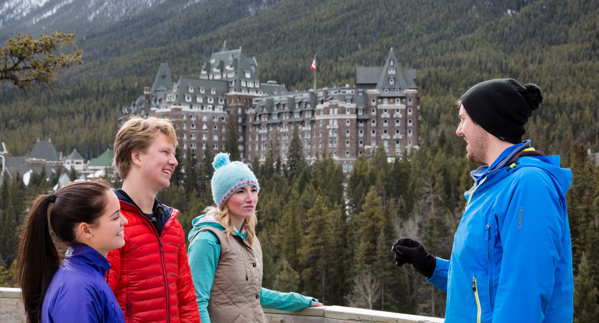 A Discover Banff Tours tour group stops to admire the view from Surprise Corner in Banff National Park