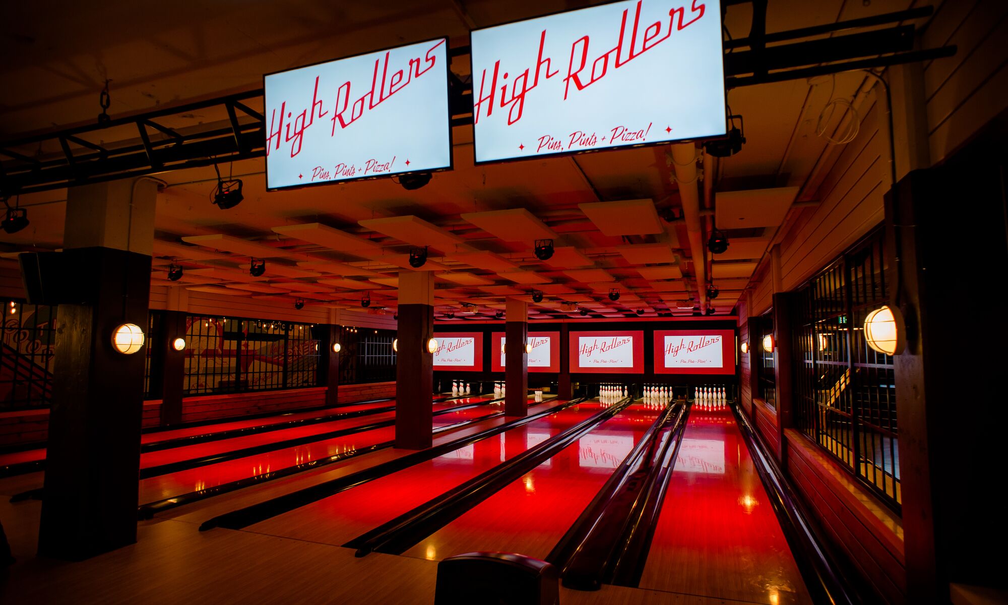 Interior of a red and white bowling alley called High Rollers on Banff Ave in Banff National Park.