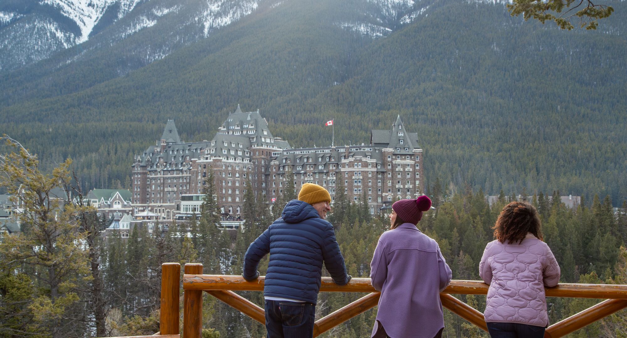 Group of people on a guided tour in Banff town in the winter in Banff National Park