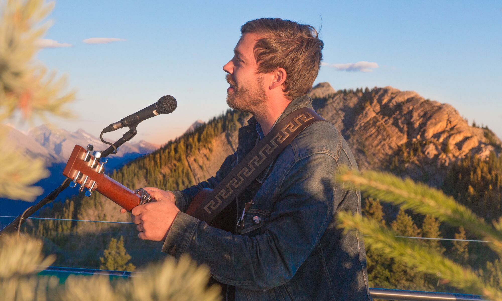 A man singing at the Banff Gondola Sunset Festival, a popular event in Banff in September