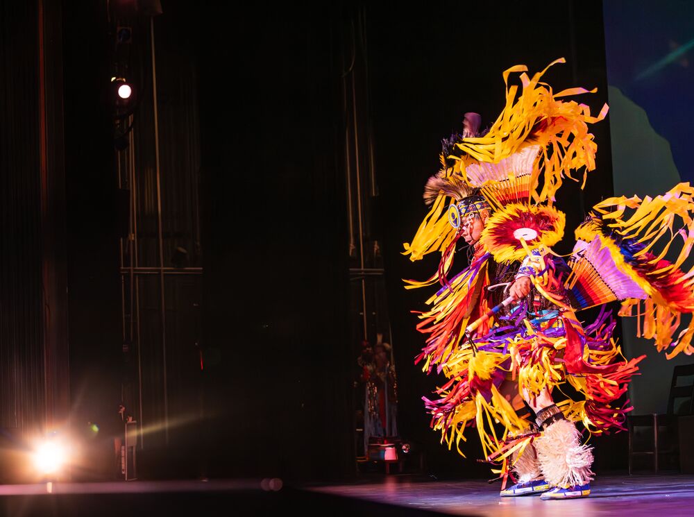 A grass dancer performing at the Banff Center for arts and creativity.