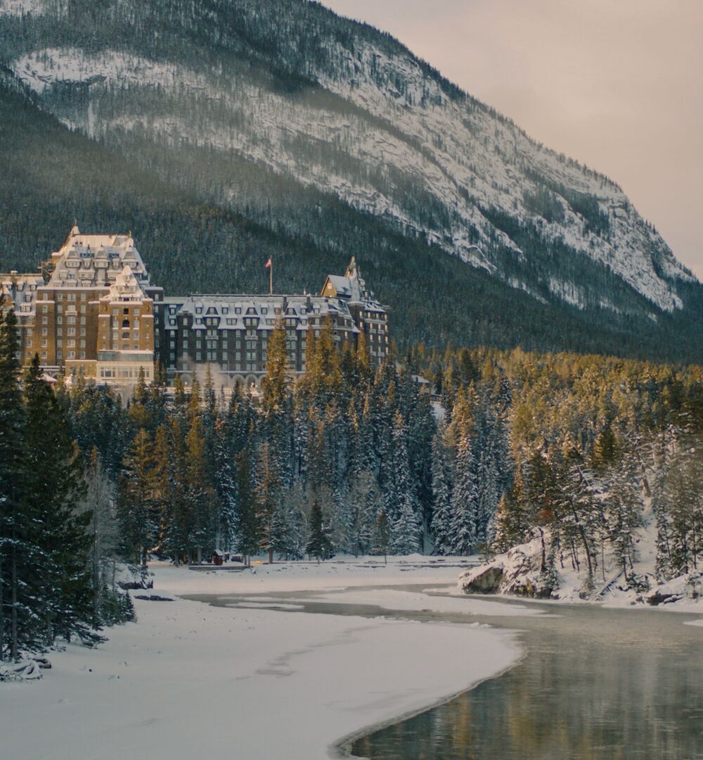 The Fairmont Banff Springs overlooks the Bow River and a beautiful winter landscape