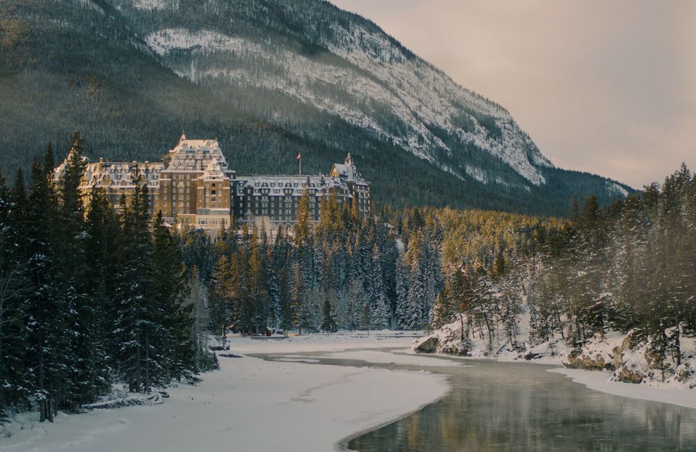 The Fairmont Banff Springs overlooks the Bow River and a beautiful winter landscape