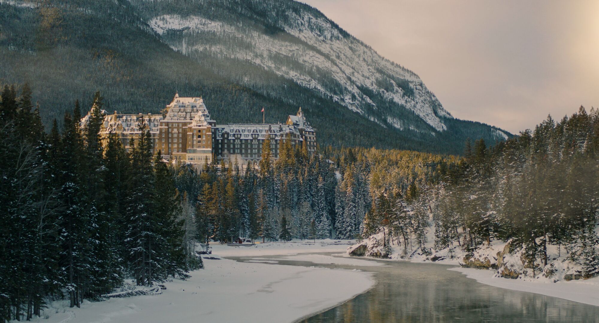 The Fairmont Banff Springs overlooks the Bow River and a beautiful winter landscape