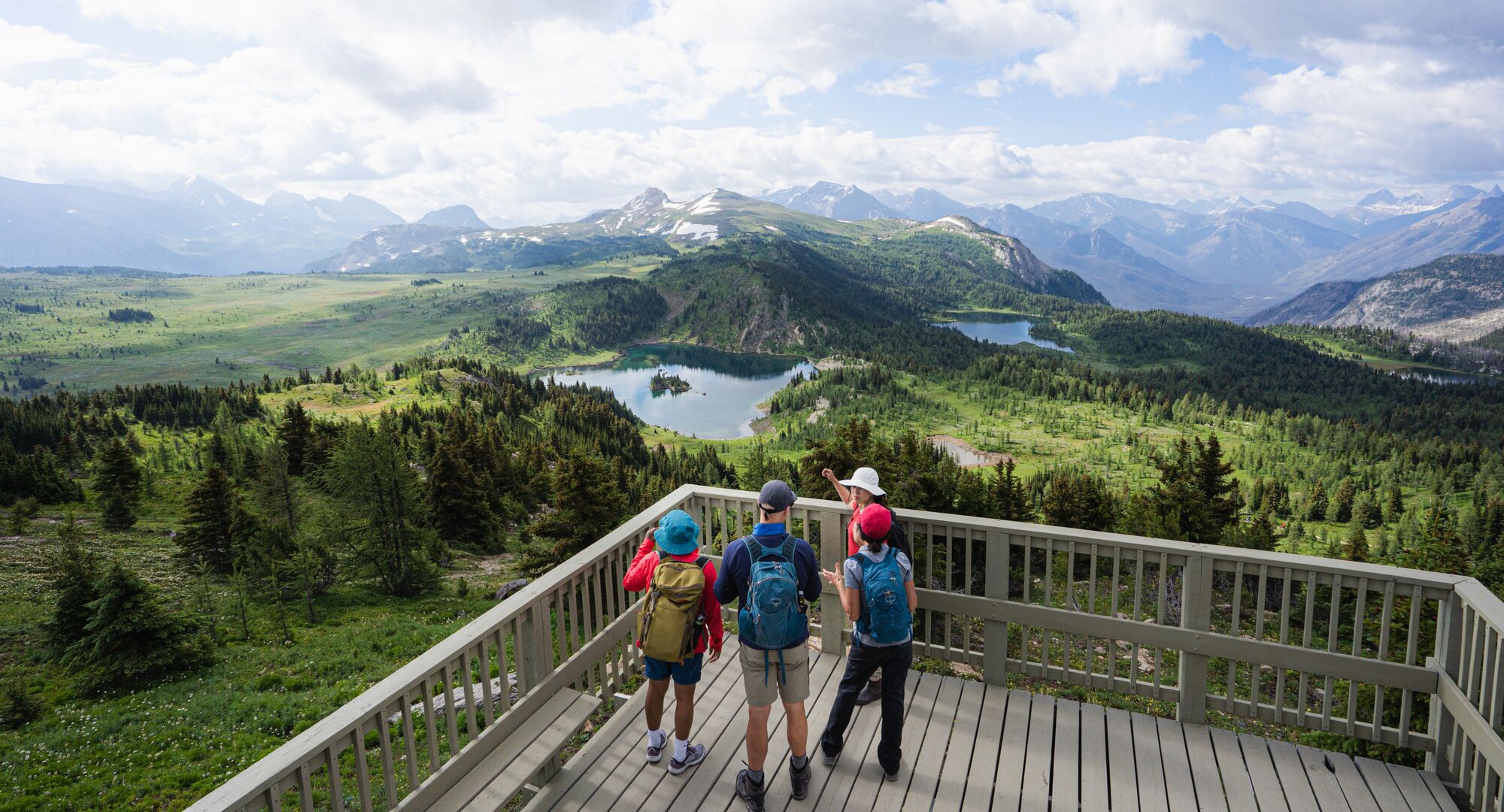 Group at the Standish Viewing Deck at Sunshine Meadows in the summer