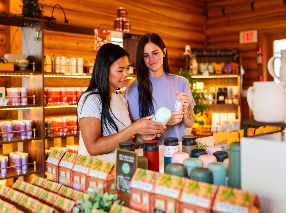 Two women shopping for tea in Banff National Park