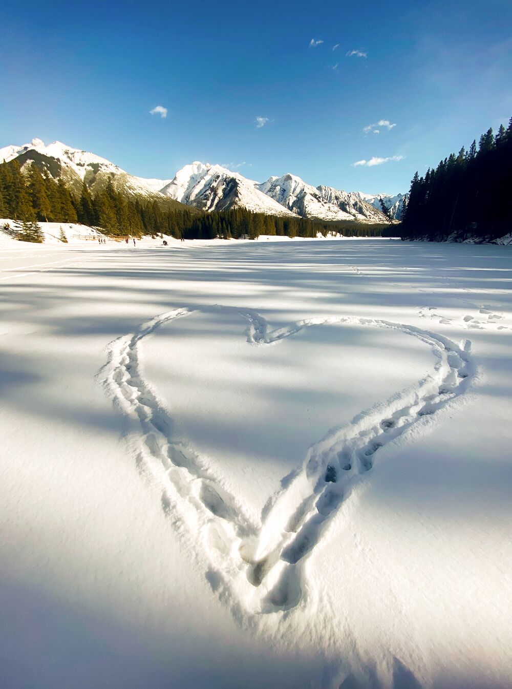 A heart that someone stepped into the snow at Johnson Lake - one of Banff's best hikes in winter.