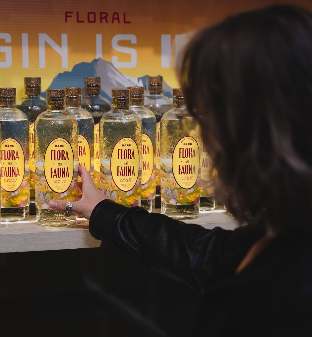 A woman shopping for gin at Park Distillery.