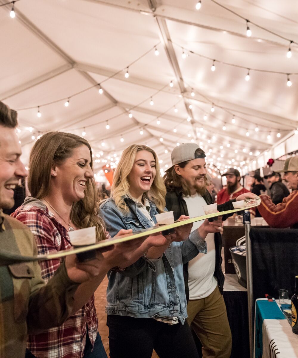 The guests are enjoying Banff Craft Beer Festival at Cave and Basin National Historic Site
