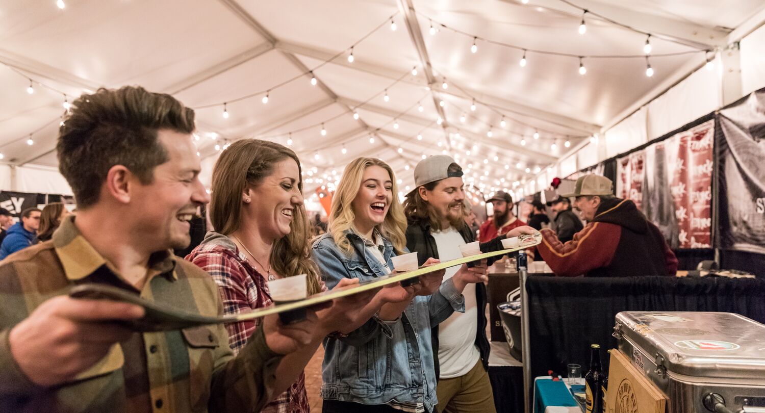 The guests are enjoying Banff Craft Beer Festival at Cave and Basin National Historic Site