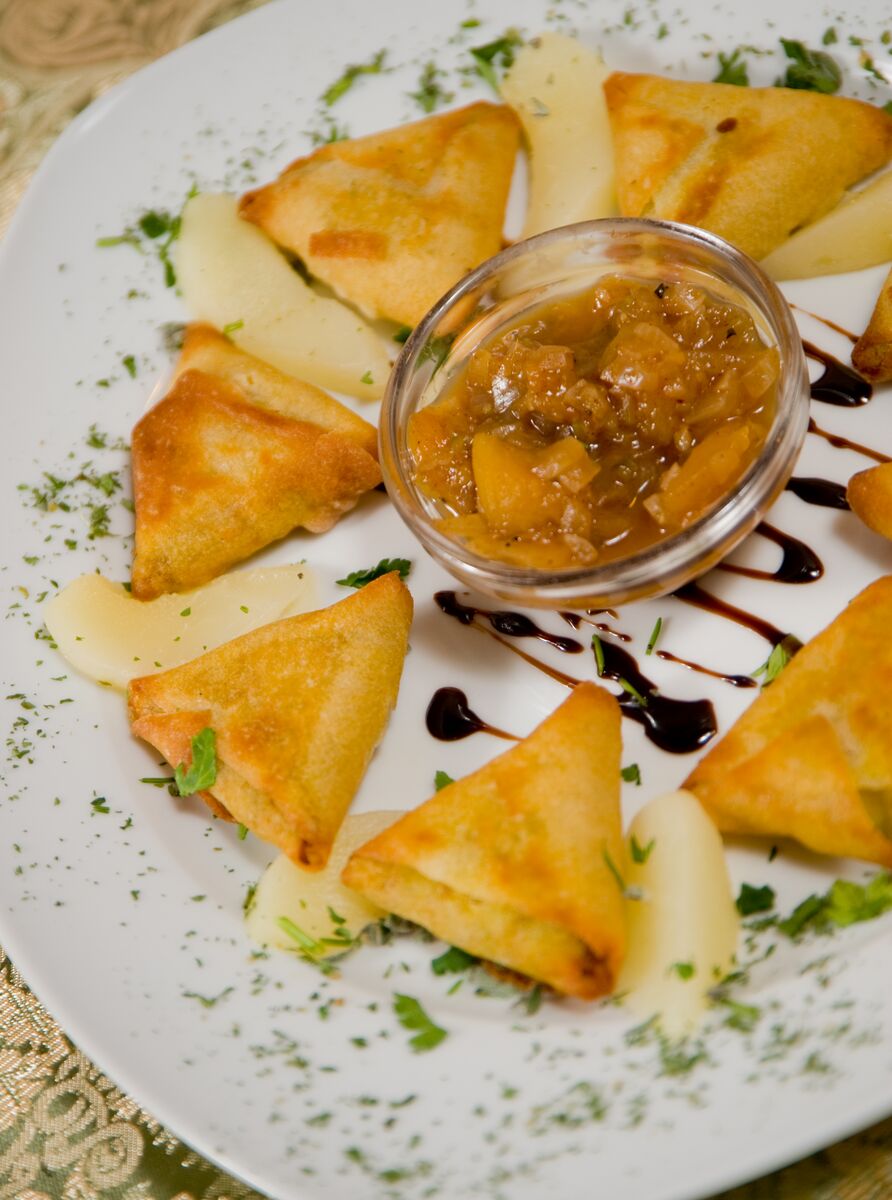 Samosas sit on a plate in at Nourish Bistro in Banff National Park.