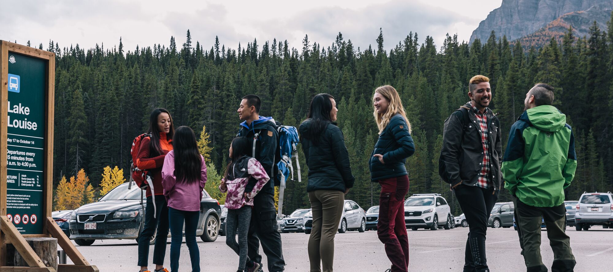 The passengers are waiting for a shuttle to come going to Lake Louise.