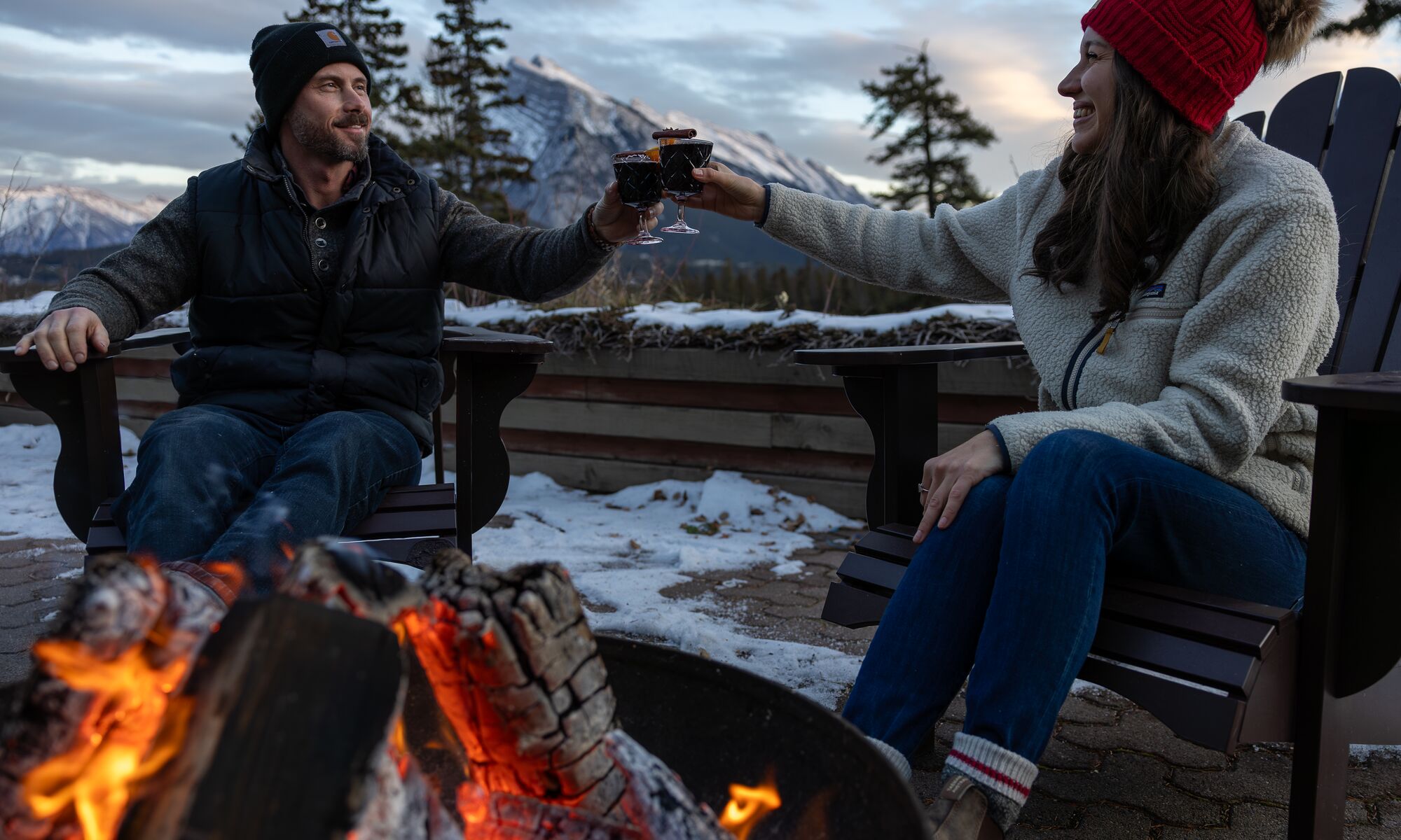 Two people enjoying après at Juniper Bistro.
