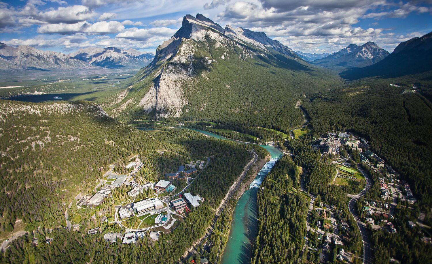 View of Banff townsite looking down from above in the summer