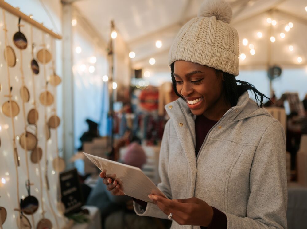 A woman shops at the Banff Christmas Market in Banff National Park.