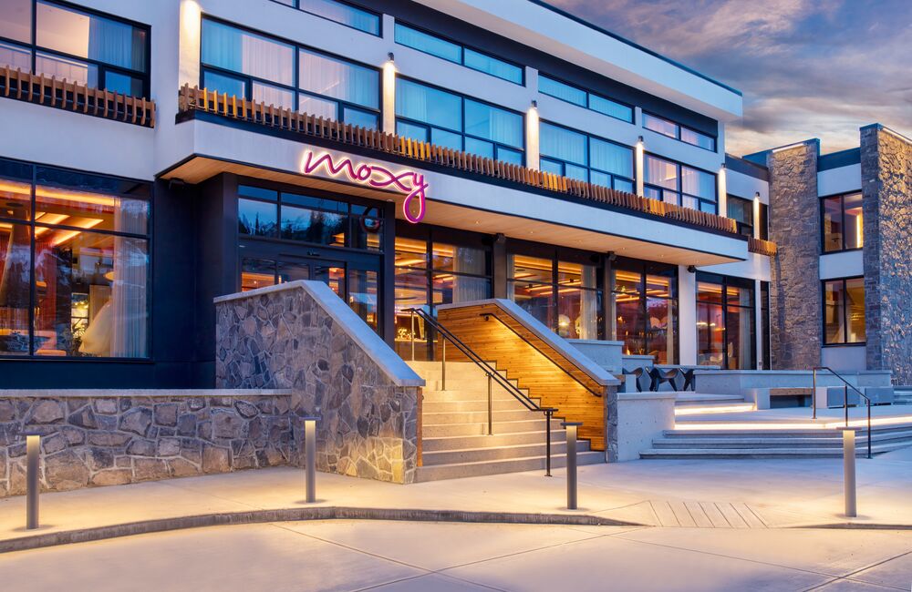 A hotel in Banff named The Moxy Banff, with a retro modern vibe.