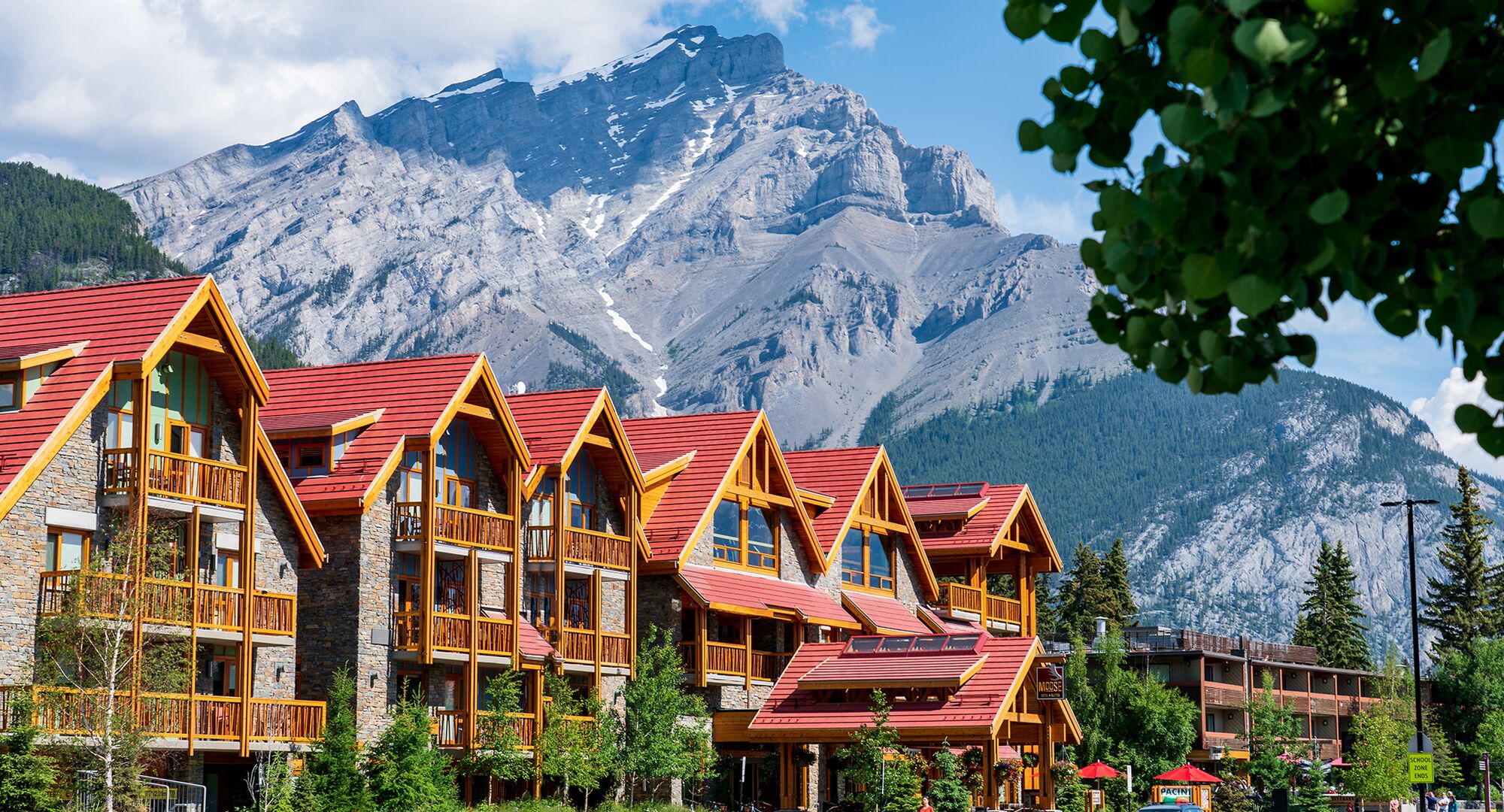 Moose Hotel and Suites in the Town of Banff with Cascade Mountain in the background