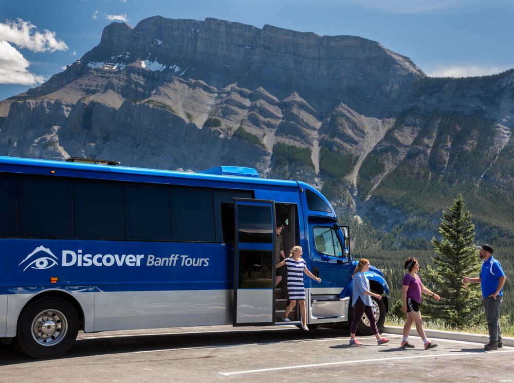 People on a sightseeing tour in Banff National Park, a popular thing to do in August