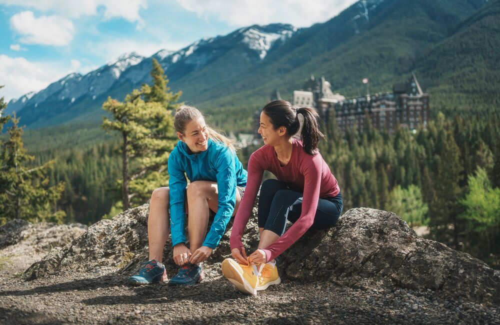 Two people on a guided trail running tours in Banff National Park