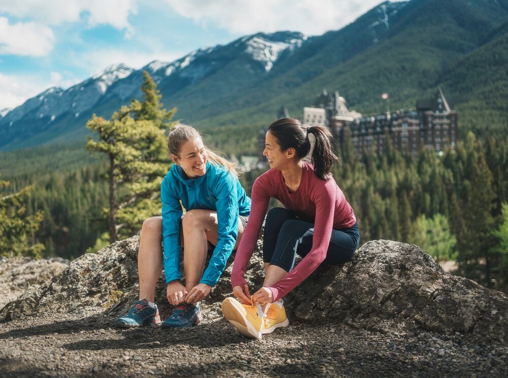 Two people on a guided trail running tours in Banff National Park