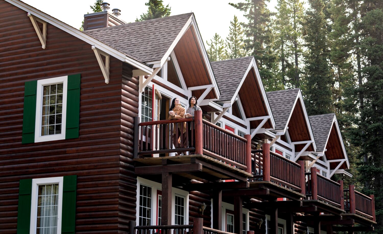 A couple on their balcony at Paradise Lodge in Banff National Park.