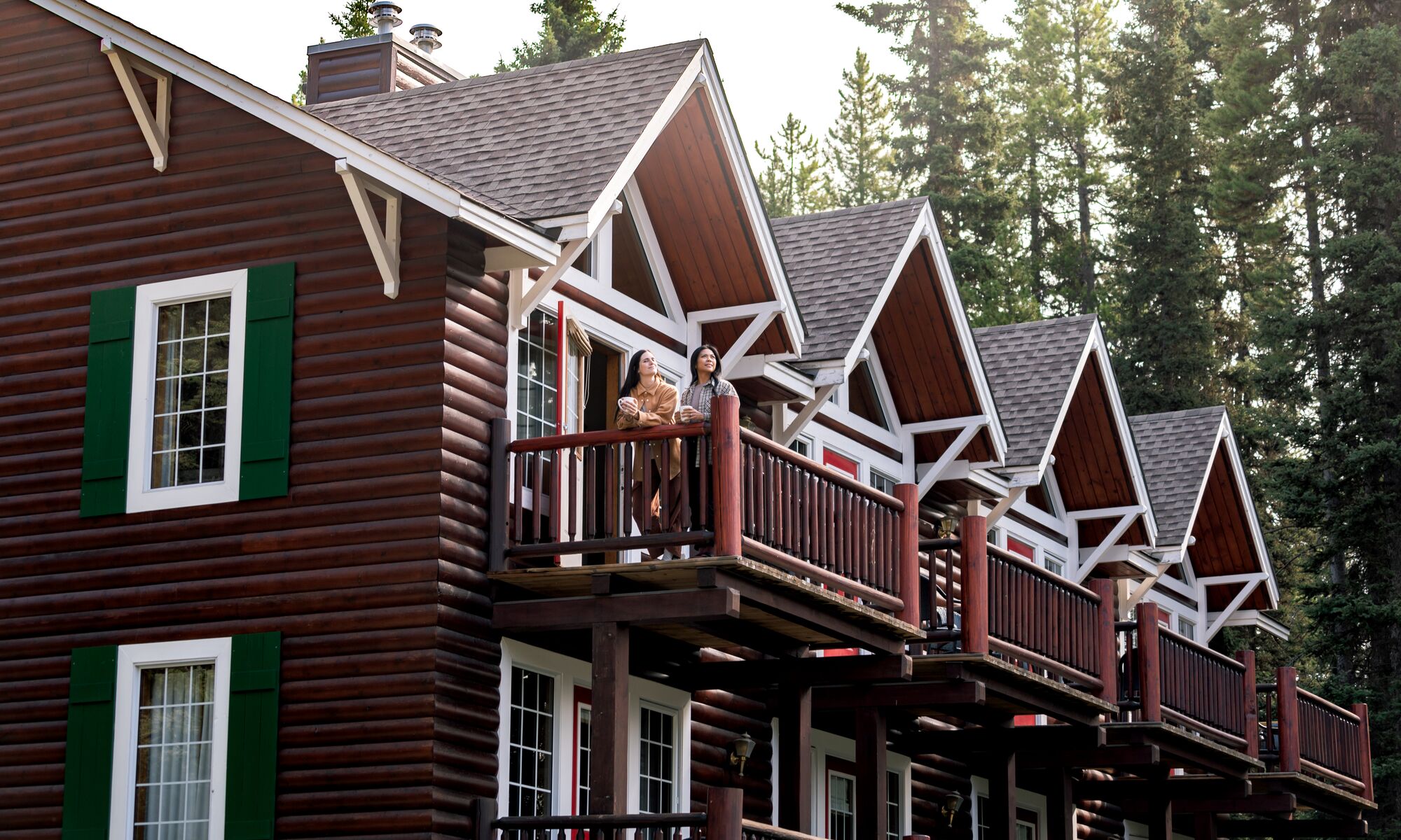 A couple on their balcony at Paradise Lodge in Banff National Park.