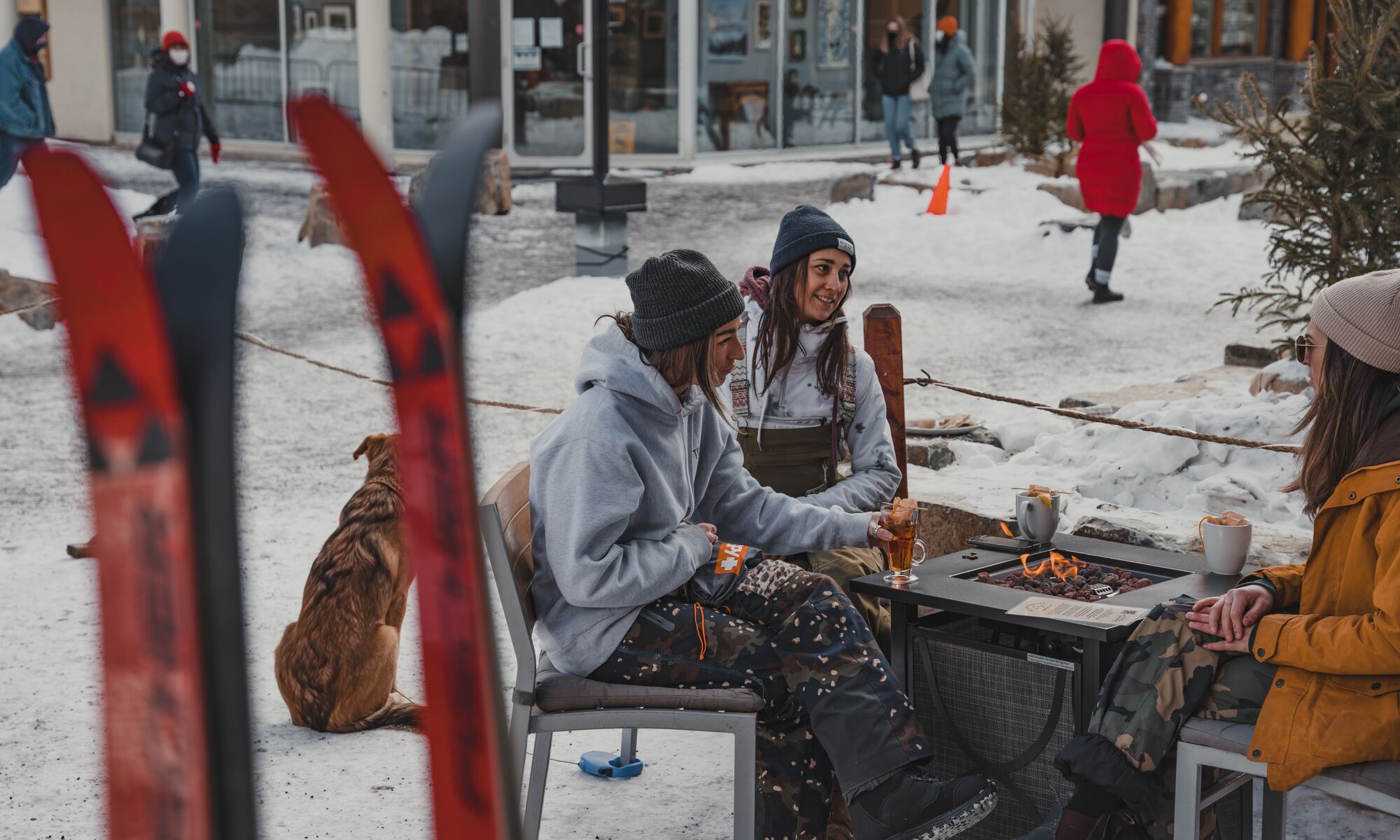 Three friends enjoying après ski at Bear Street Tavern.