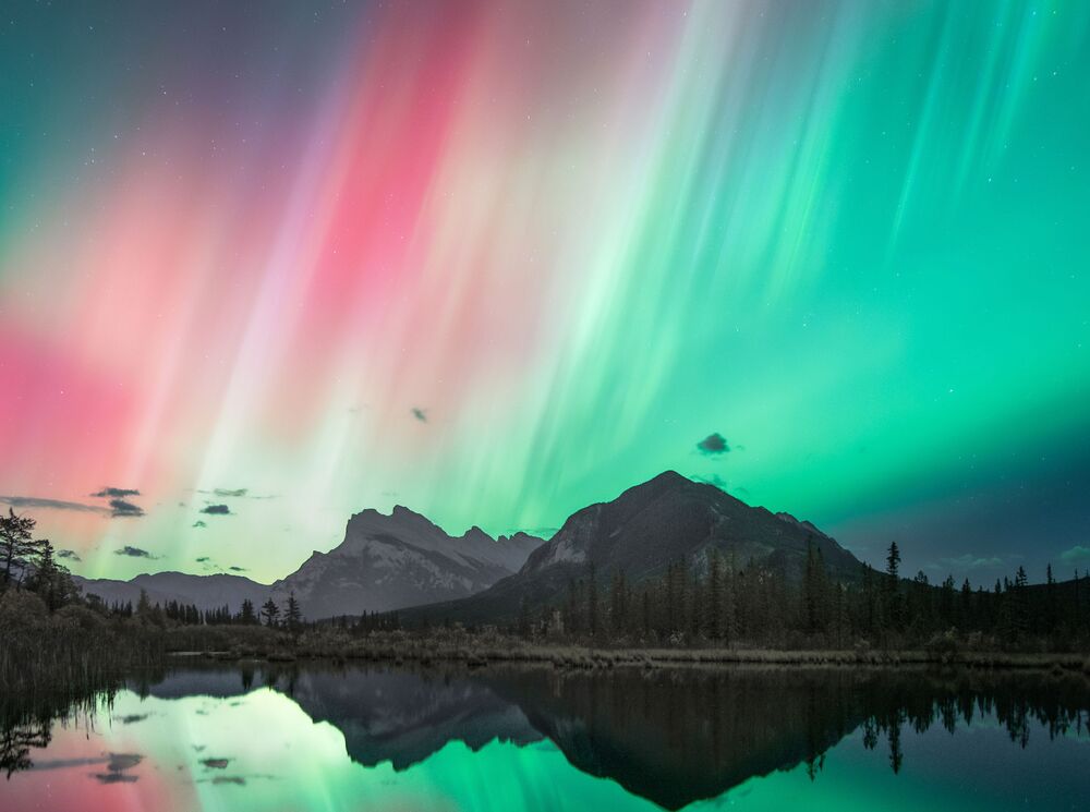 Northern lights over Lake Minnewanka in Banff National Park.