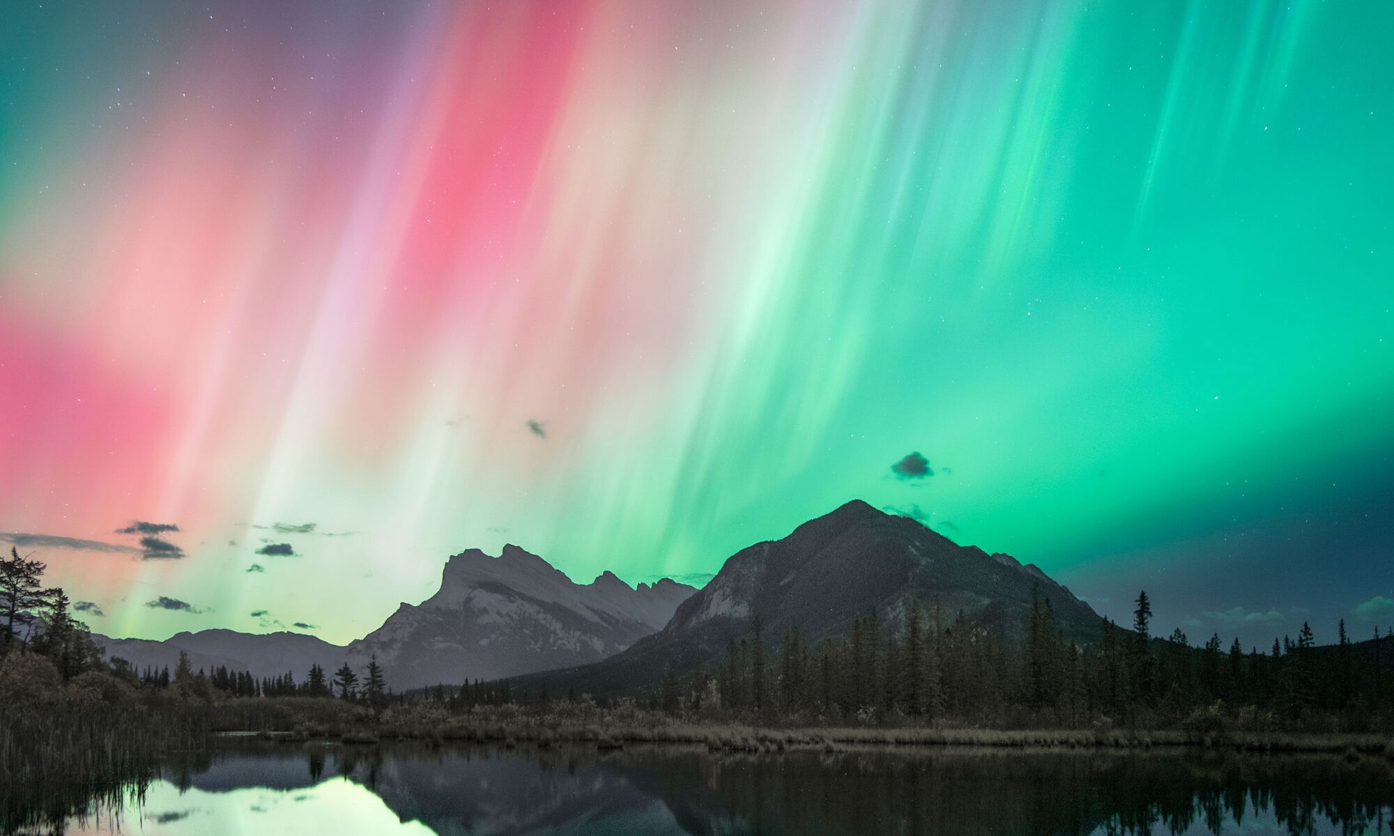 Northern lights over Lake Minnewanka in Banff National Park.