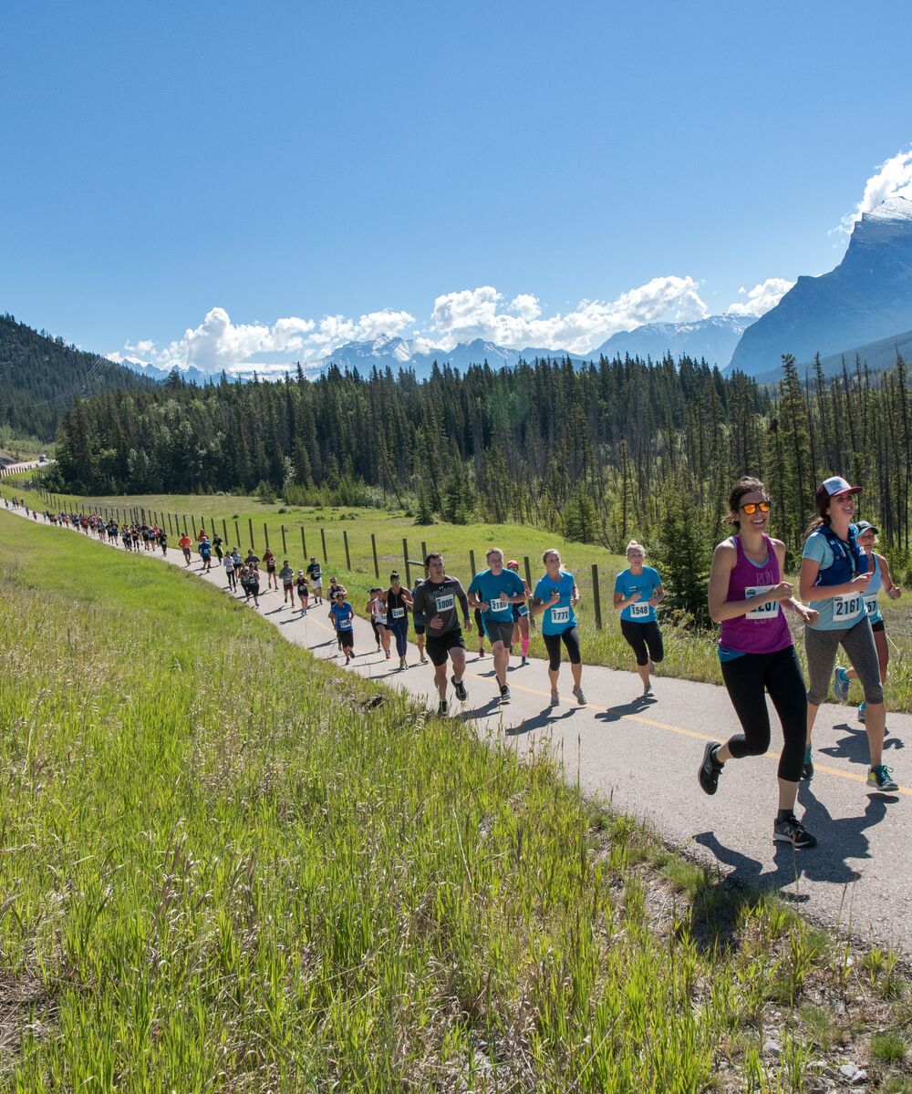 People running along the legacy trail in Banff for the Banff Marathon
