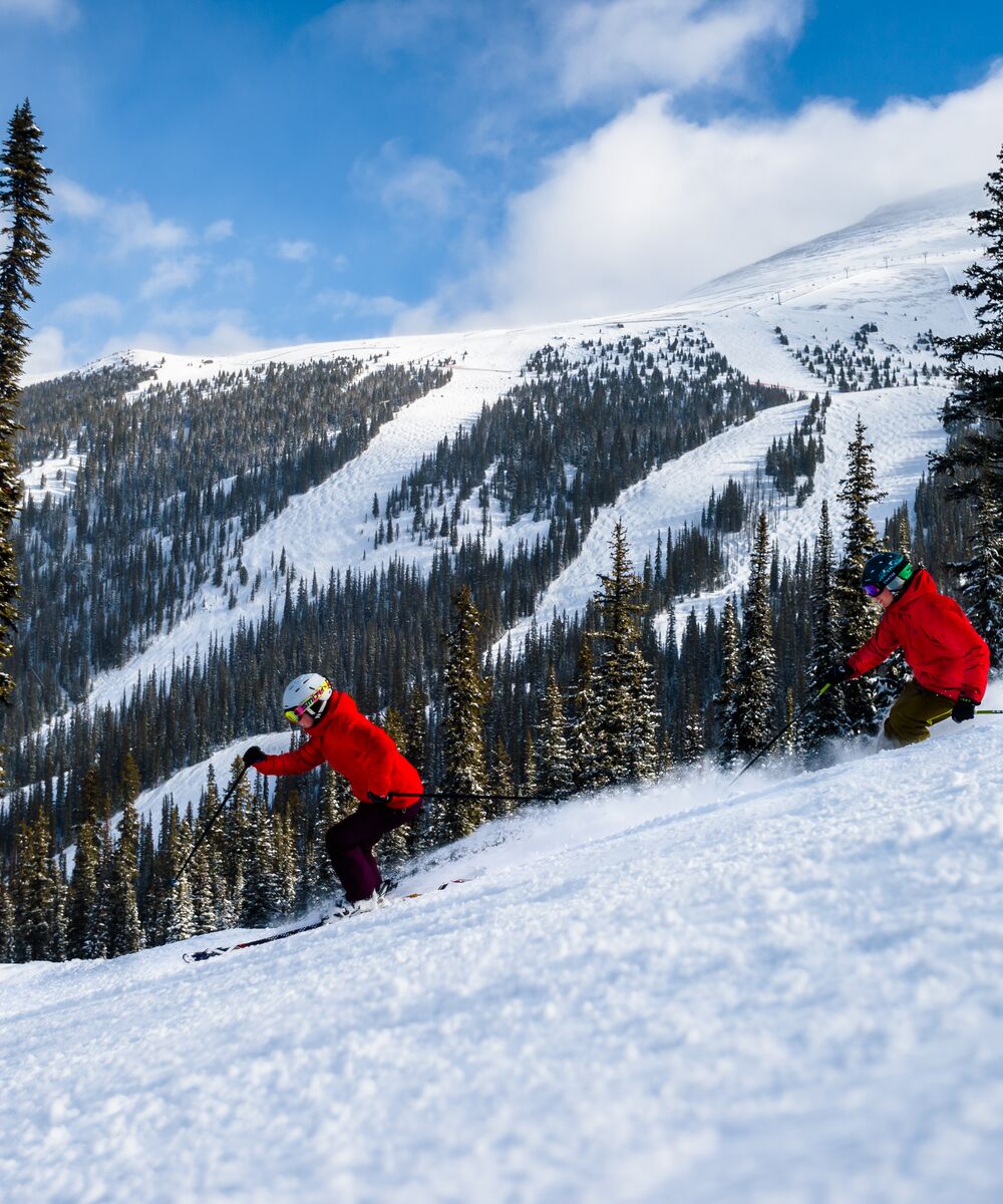 Two skiers at Mount Norquay