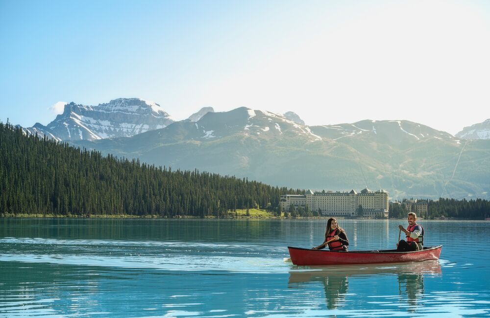 Two people canoeing on Lake Louise in Banff National Park