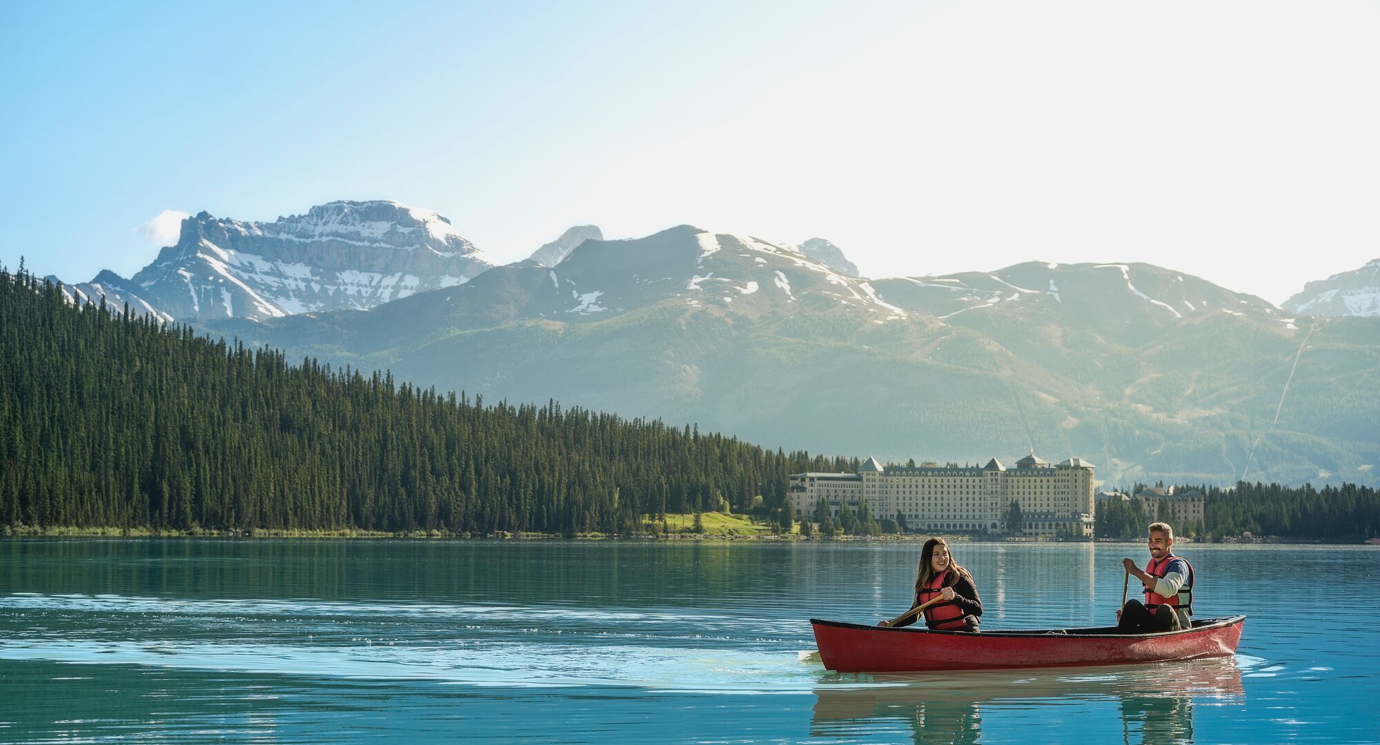 Two people canoeing on Lake Louise in Banff National Park