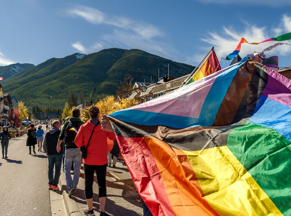 A poster for Banff Pride with a bear and their logo on it.