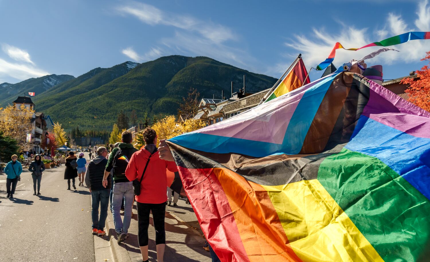 A poster for Banff Pride with a bear and their logo on it.