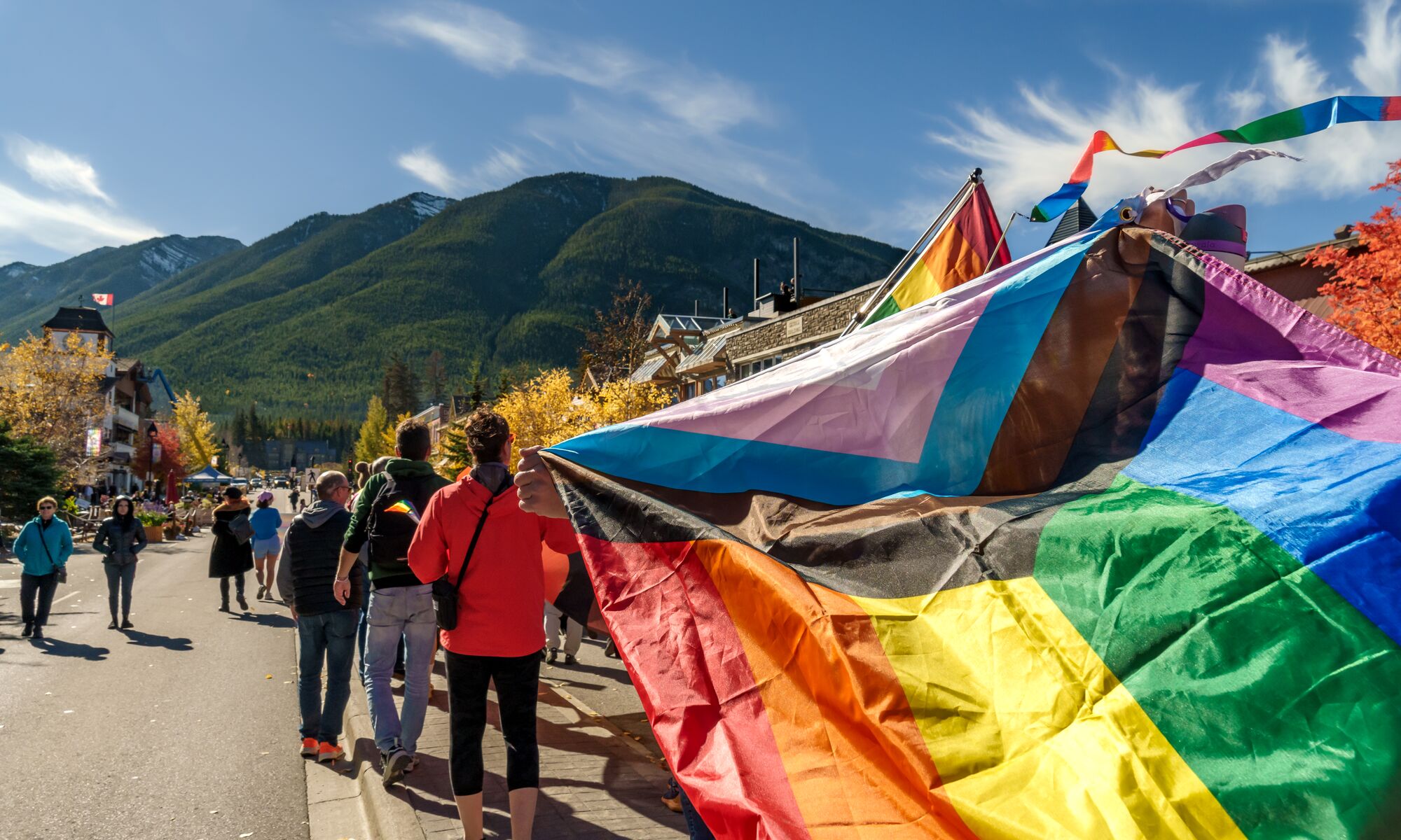 A poster for Banff Pride with a bear and their logo on it.