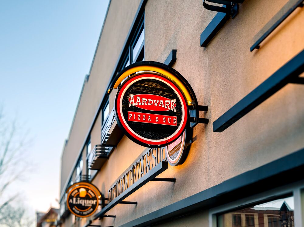 Aardvark Pizza & Subs sign in Banff on Caribou Street.