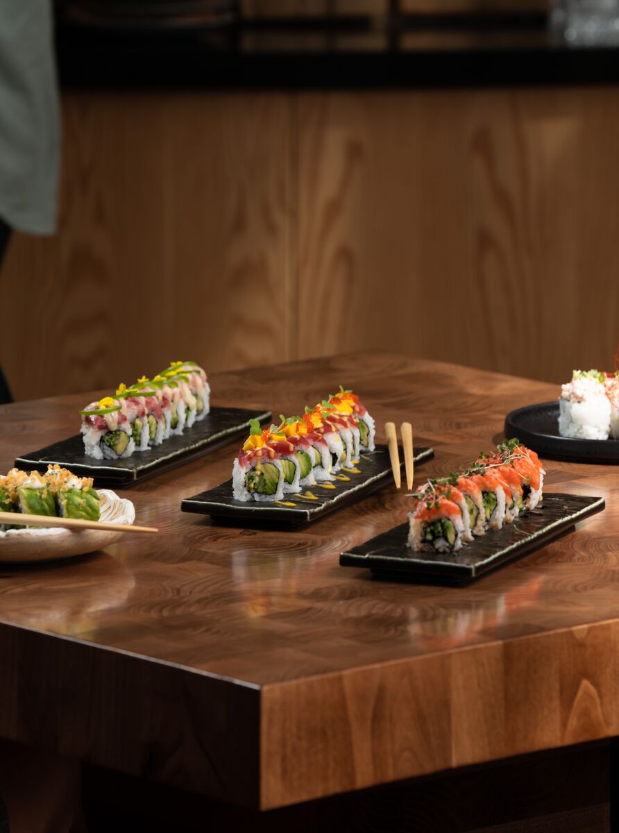 Sushi sits on a wooden table at Hello Sunshine in Banff, Alberta, Canada.