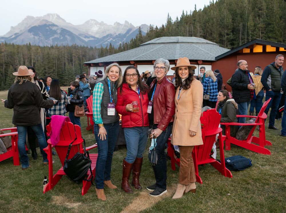 A group of Business Events professionals at a gathering in Banff National Park. 