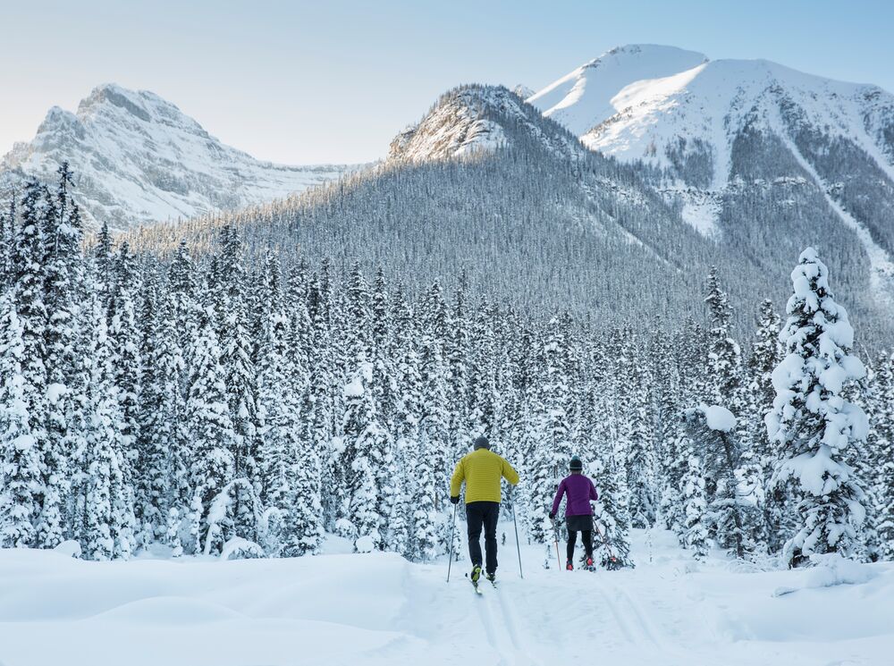 The couple is enjoying their Cross Country Skiing at Moraine Lake.