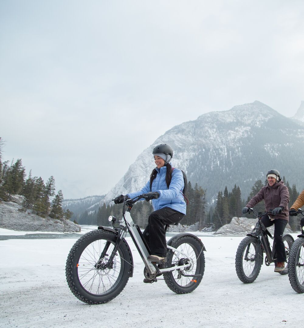 A group of people on a fat biking tour through Banff National Park with Bikescape