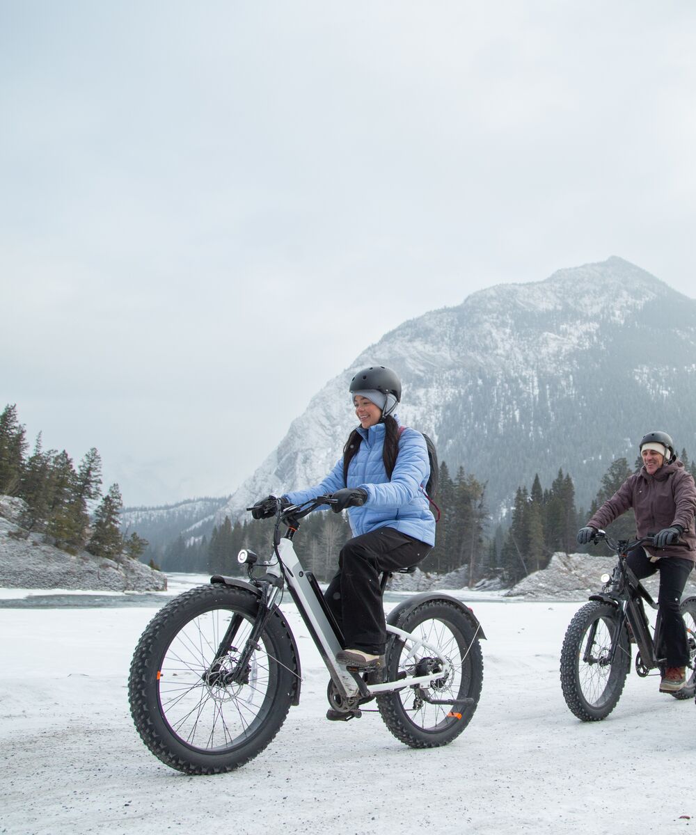 A group of people on a fat biking tour through Banff National Park with Bikescape